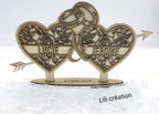 Double cœur en bois gravé